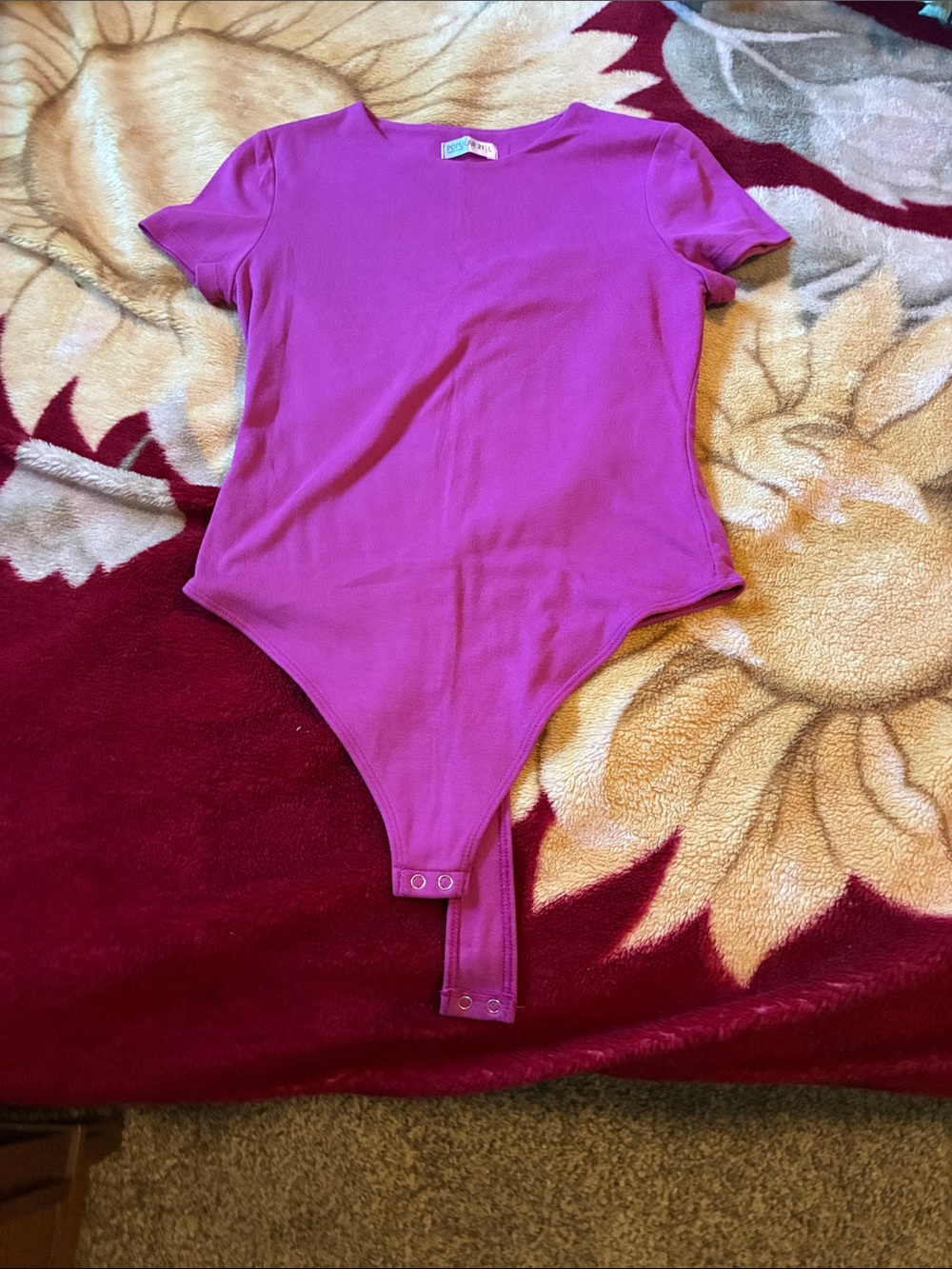 Pink One-Piece Bodysuit